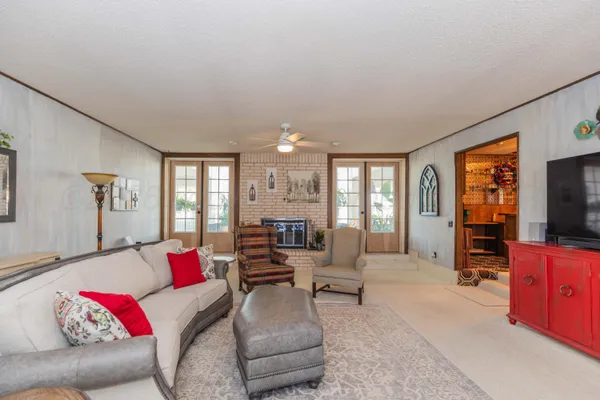 a kitchen with stainless steel appliances granite countertop a sink and cabinets
