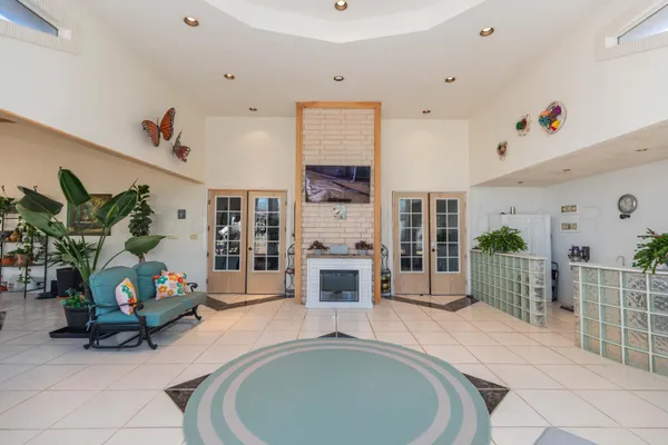 a view of walk in closet with clothes