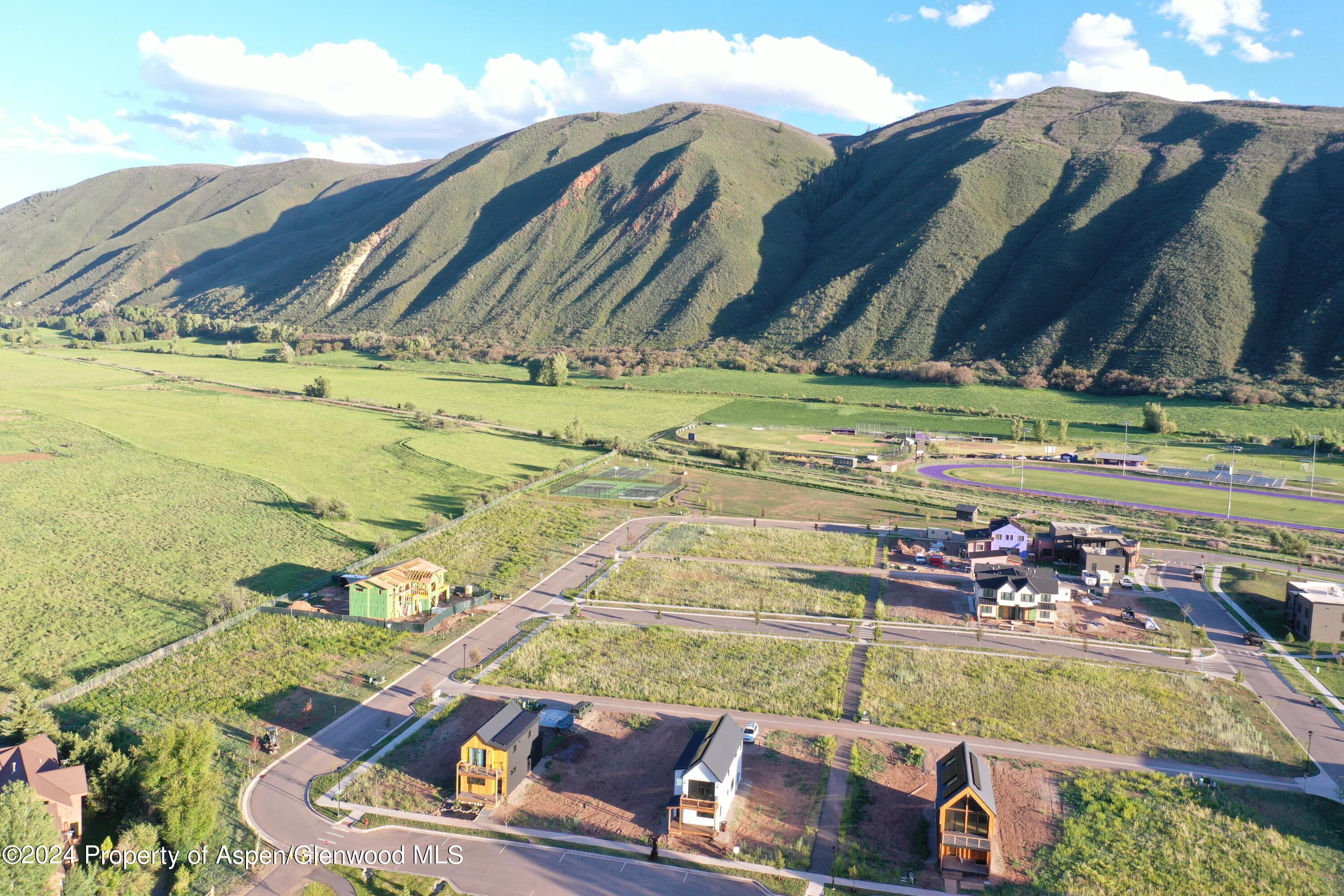 388 Amesbury Drive Basalt, CO 81621 - Photo 7 of 8 a view of a swimming pool with a yard
