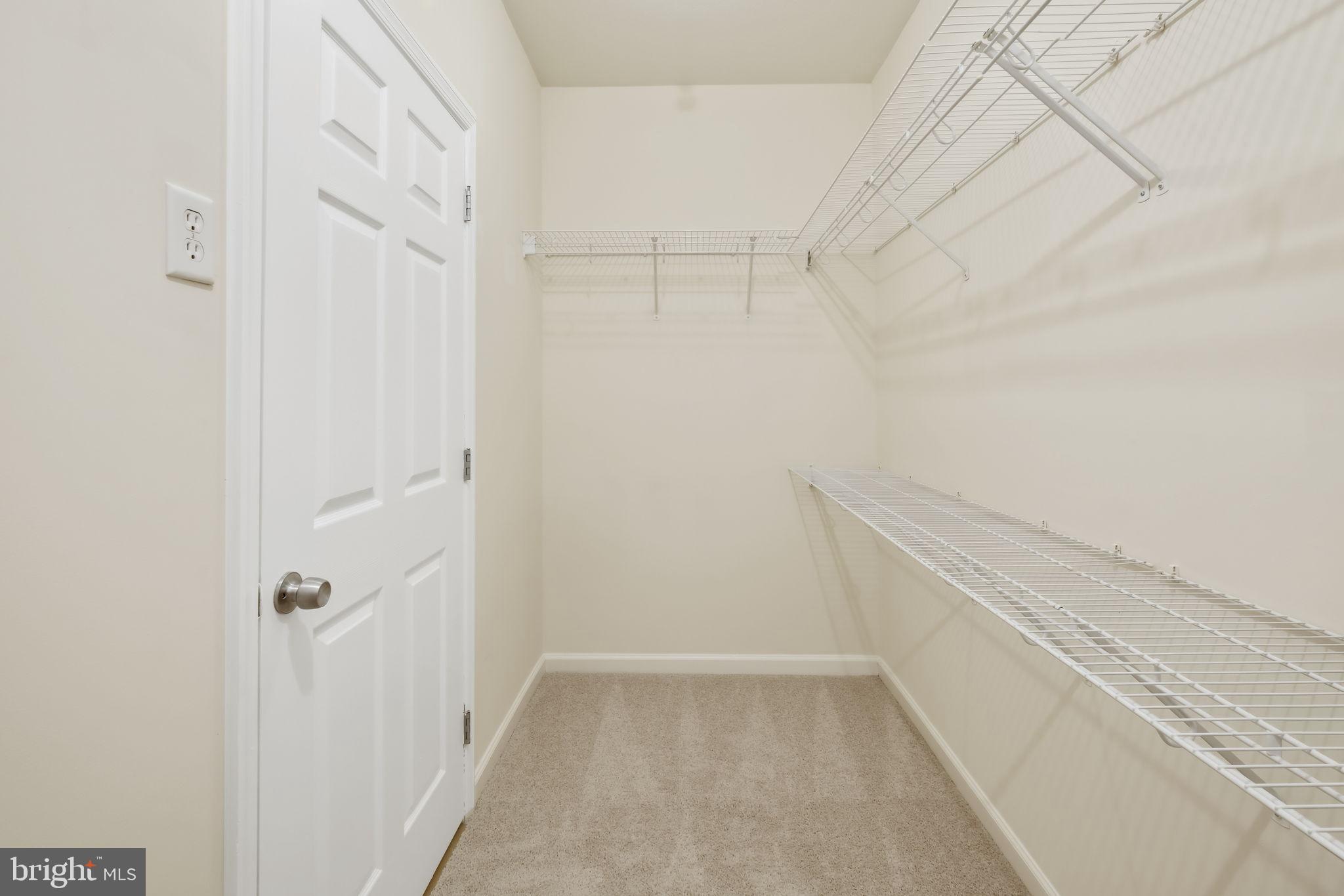 1 Arch Place, Unit 220 Gaithersburg, MD 20878 - Photo 11 of 26 Spacious, walk in closet in Primary BR