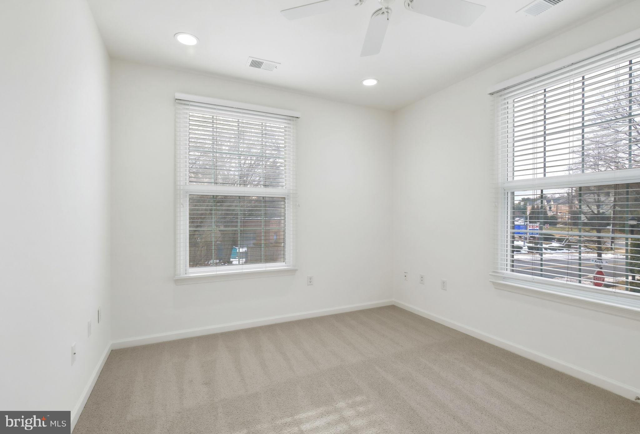 1 Arch Place, Unit 220 Gaithersburg, MD 20878 - Photo 13 of 26 Bright and airy 3rd bedroom with natural light.