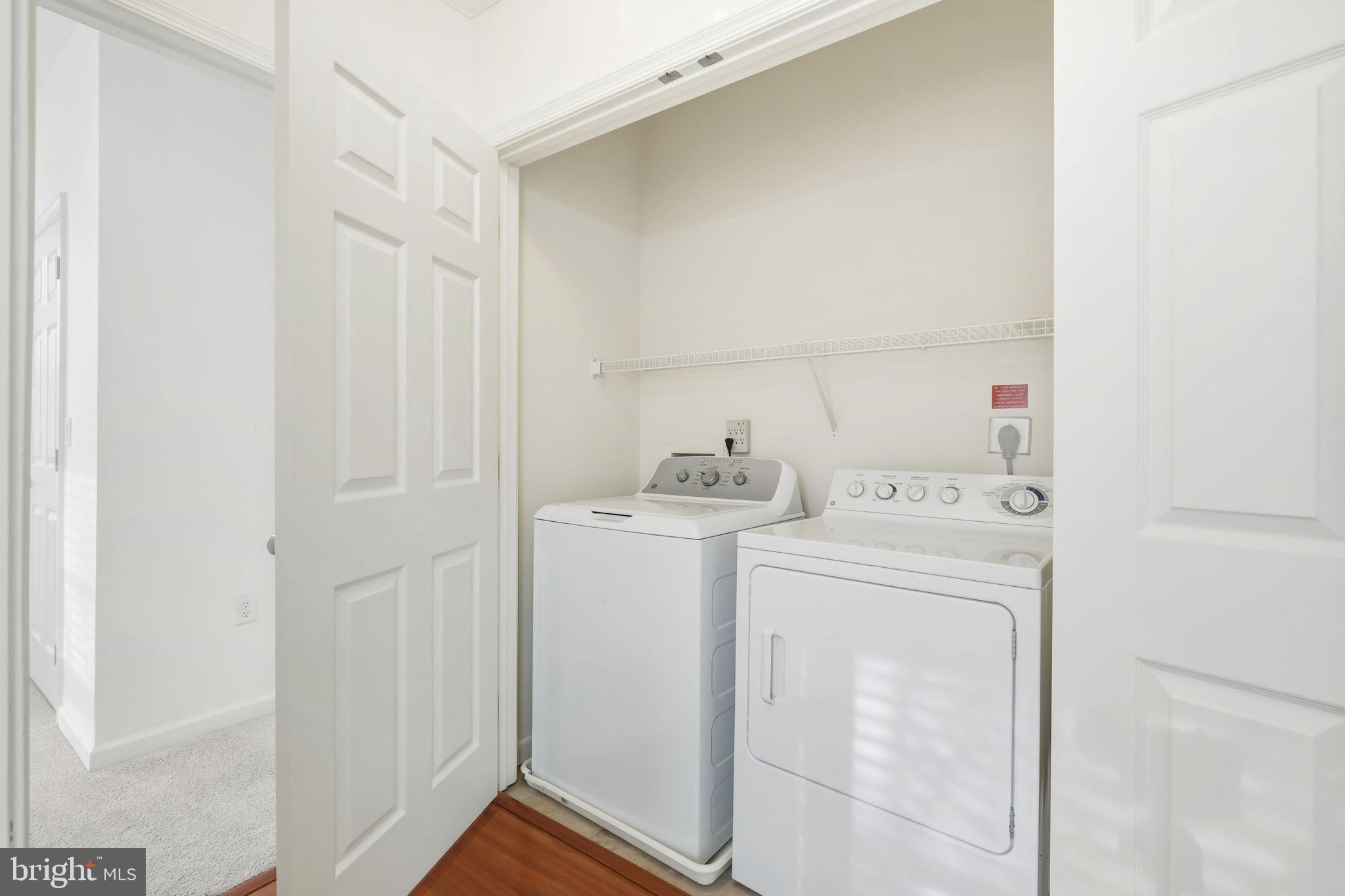1 Arch Place, Unit 220 Gaithersburg, MD 20878 - Photo 16 of 26 Efficient laundry closet