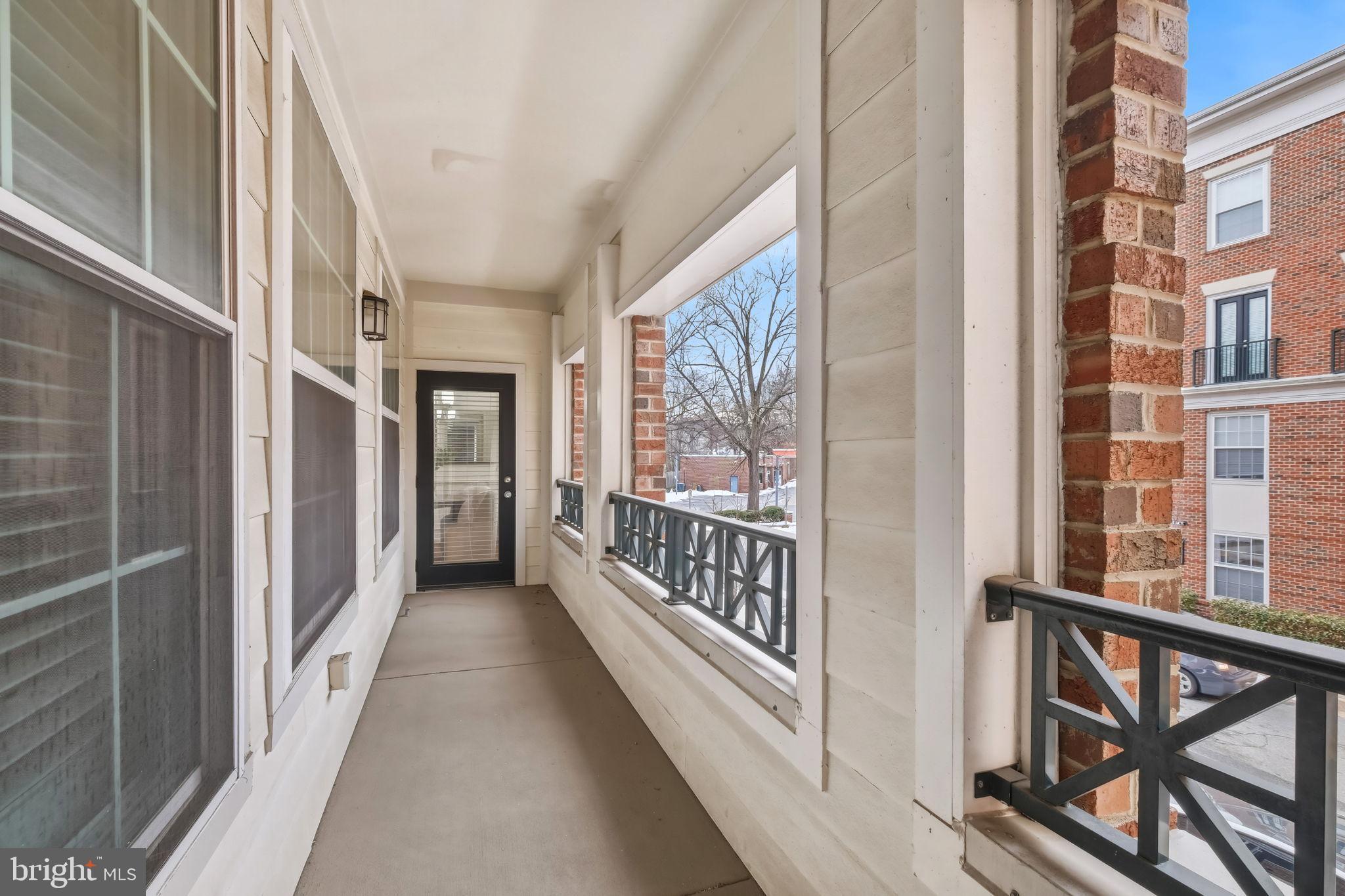 1 Arch Place, Unit 220 Gaithersburg, MD 20878 - Photo 18 of 26 Relaxing balcony with entrances from DR and PBR