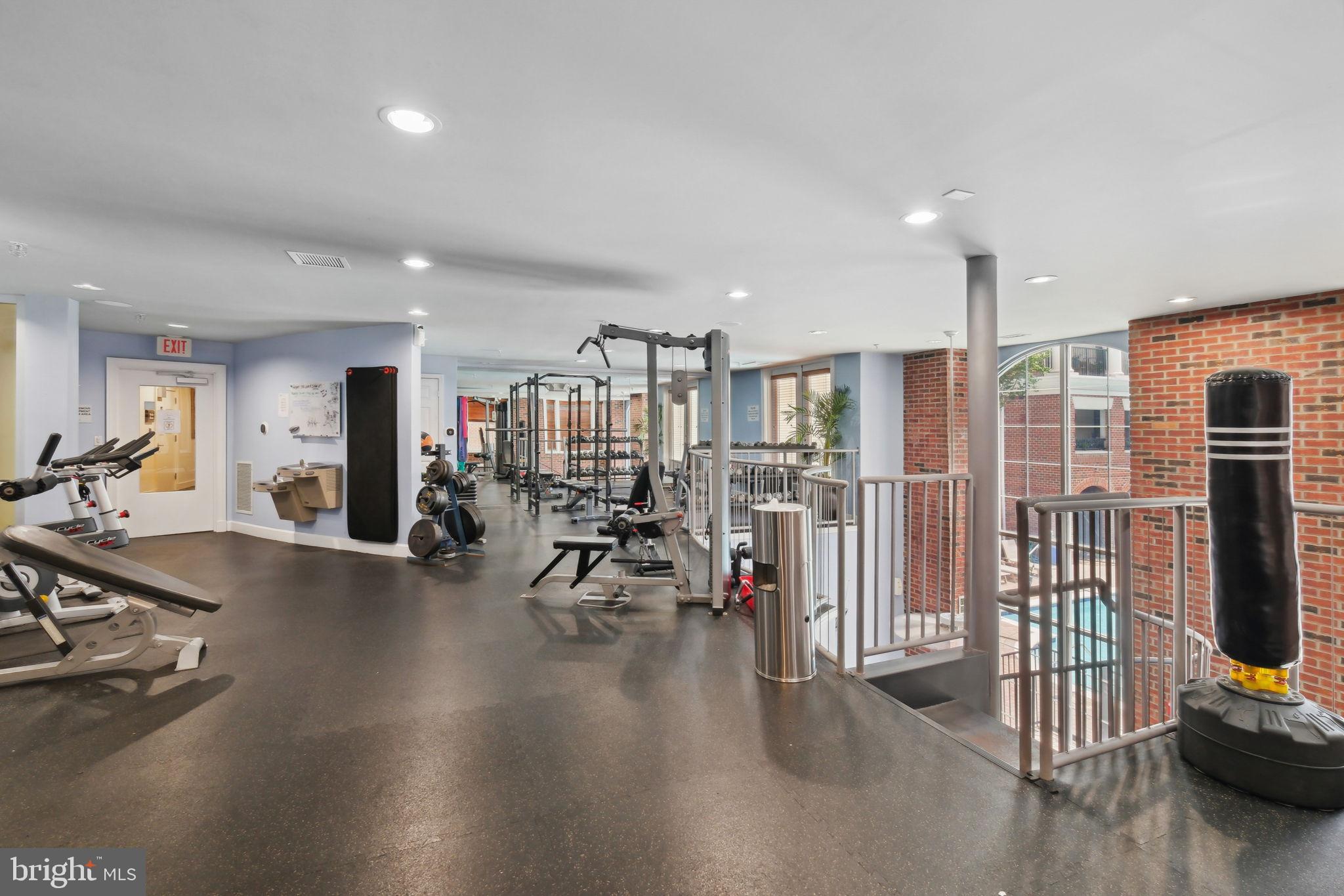 1 Arch Place, Unit 220 Gaithersburg, MD 20878 - Photo 20 of 26 Modern fitness center with ample equipment.