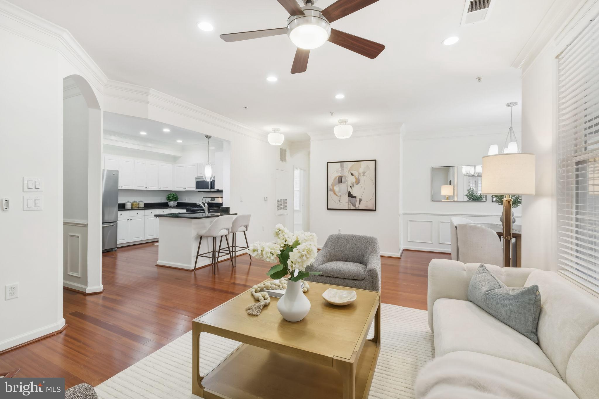 1 Arch Place, Unit 220 Gaithersburg, MD 20878 - Photo 4 of 26 Bright and airy living space with recessed lights