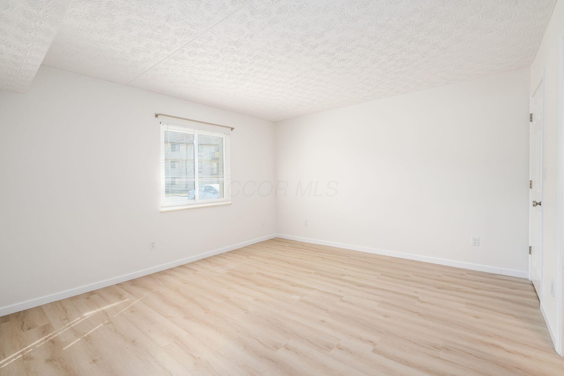 3967 Karl Road, Unit 121 Columbus, OH 43224 - Photo 15 of 27 Primary Bedroom