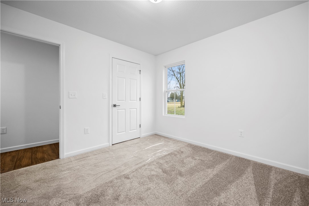 1996 East Oldgate Road Sandusky, OH 44870 - Photo 28 of 38 Unfurnished bedroom with carpet flooring. Master Builder Interior Photo