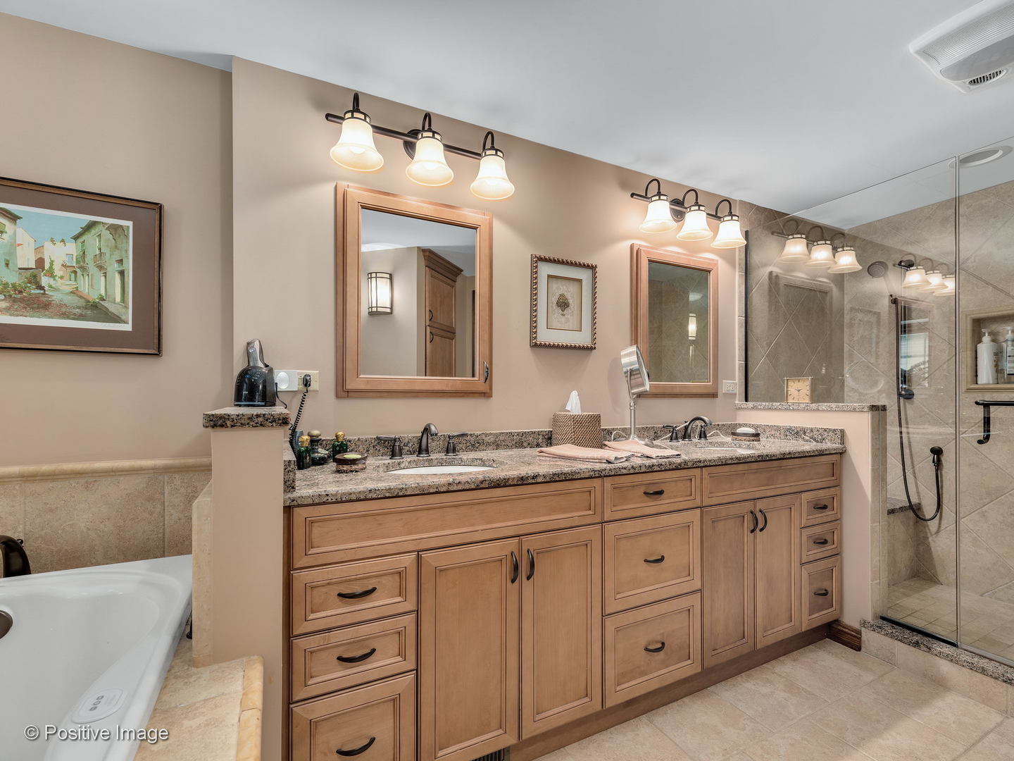 276 Blackhawk Road Riverside, IL 60546 - Photo 12 of 18 a bathroom with a double vanity sink and mirror