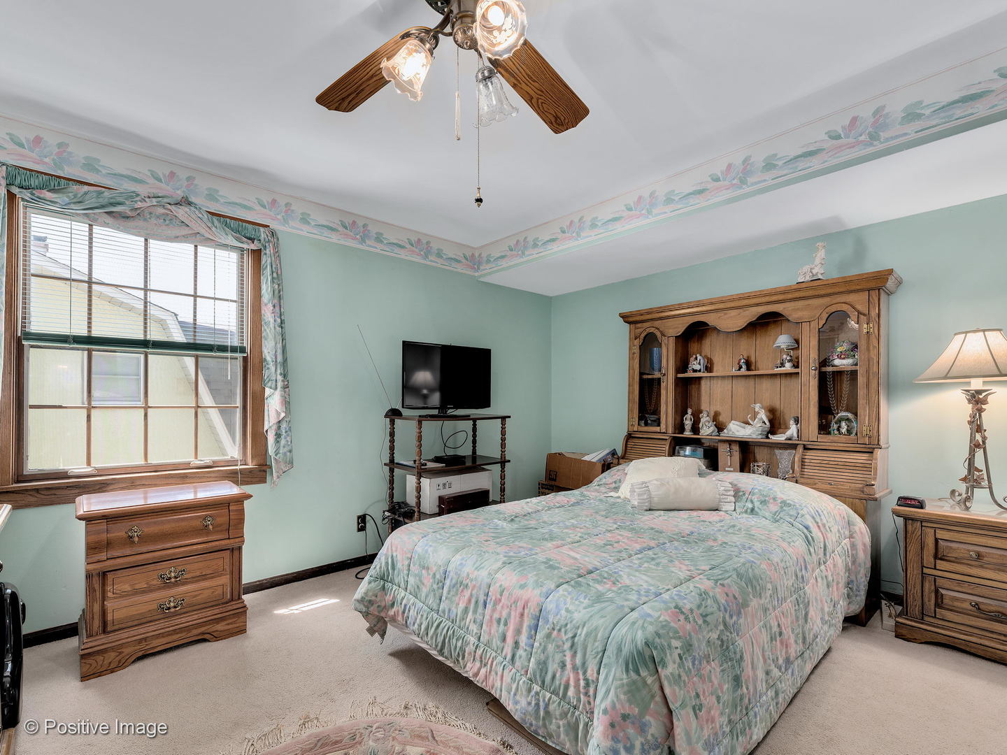 276 Blackhawk Road Riverside, IL 60546 - Photo 13 of 18 a bedroom with a bed and a tv