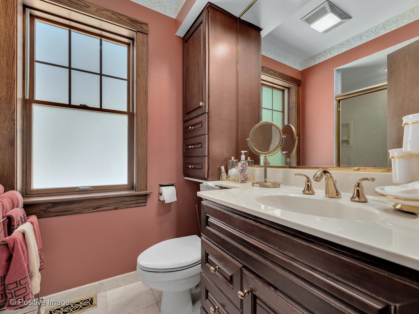 276 Blackhawk Road Riverside, IL 60546 - Photo 15 of 18 a bathroom with a granite countertop toilet sink and mirror