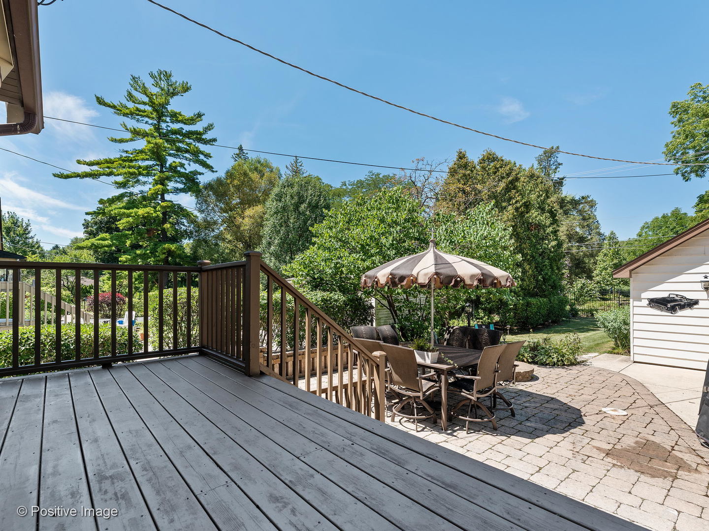 276 Blackhawk Road Riverside, IL 60546 - Photo 16 of 18 a view of a chairs and table on the wooden roof deck