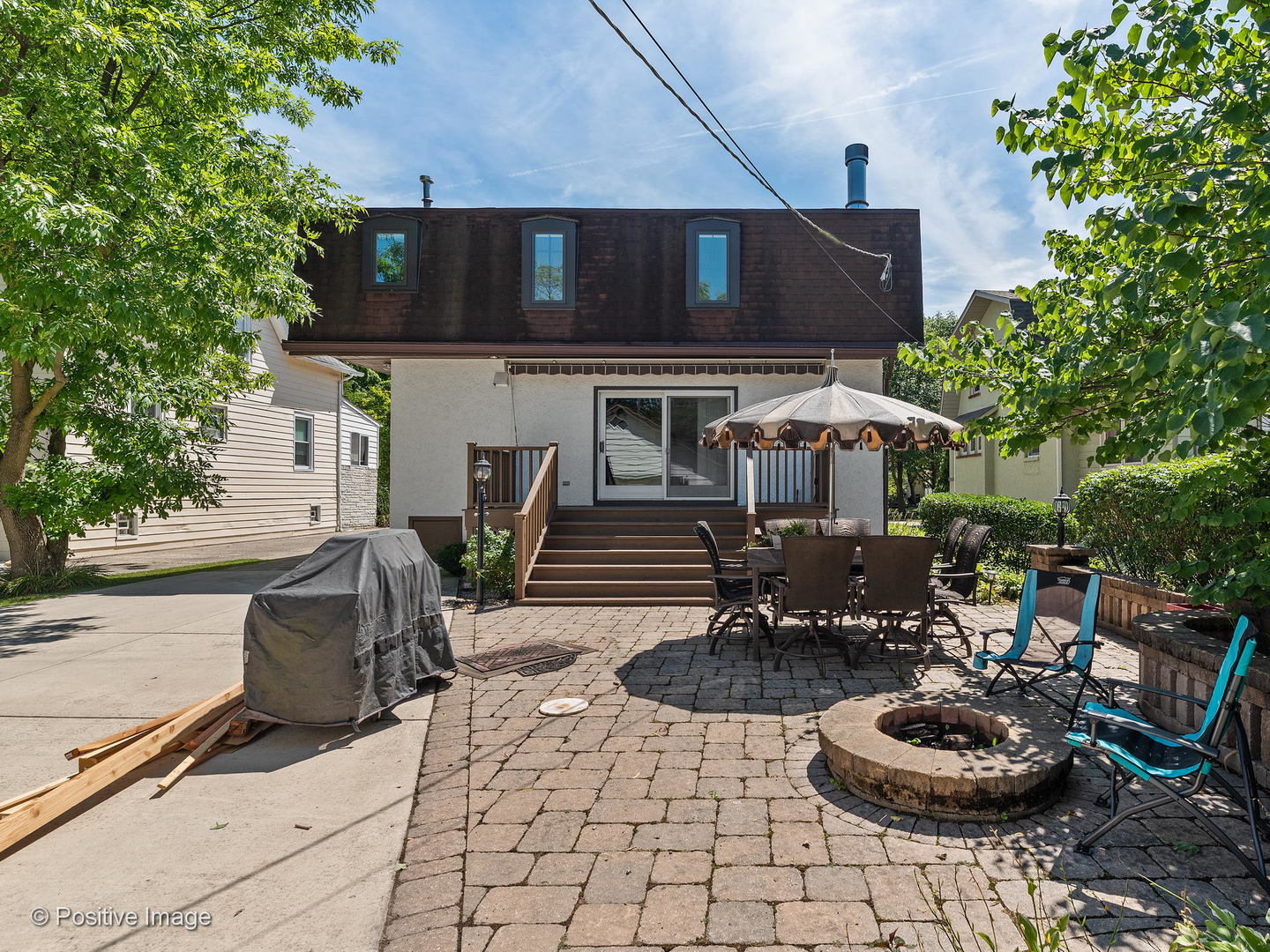 276 Blackhawk Road Riverside, IL 60546 - Photo 18 of 18 a view of a patio with chair and tables