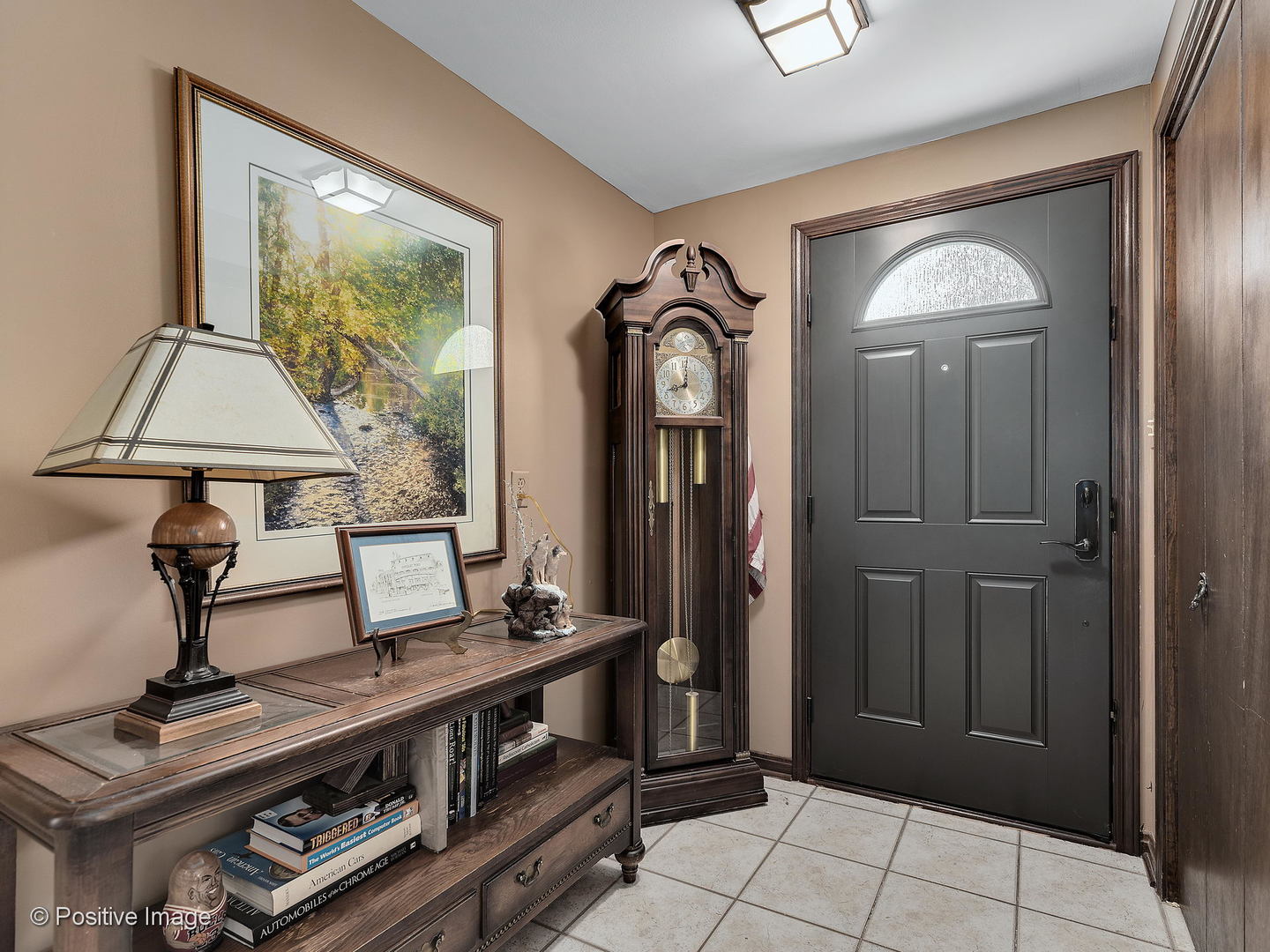 276 Blackhawk Road Riverside, IL 60546 - Photo 3 of 18 a view of a livingroom with furniture and window