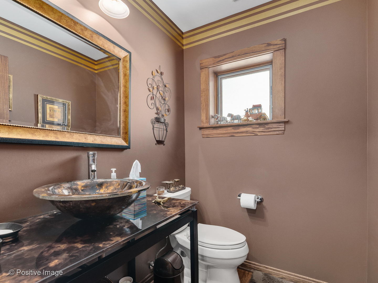 276 Blackhawk Road Riverside, IL 60546 - Photo 10 of 18 a view of a bathroom with a granite countertop sink a toilet and a mirror