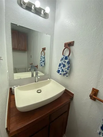 a bathroom with a toilet and a sink