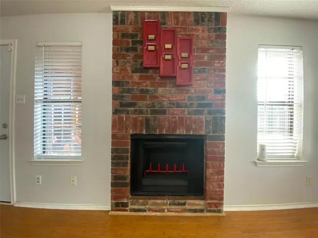 a living room with fireplace