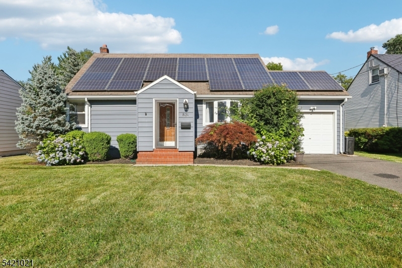 821 Hillside Road Rahway, NJ 07065 - Photo 1 of 33 a front view of a house with a yard