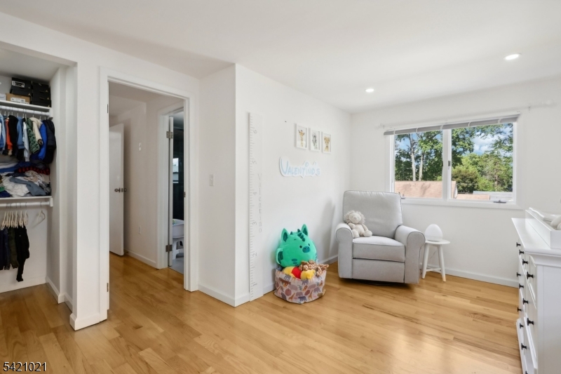 821 Hillside Road Rahway, NJ 07065 - Photo 19 of 33 a living room with furniture and a potted plant