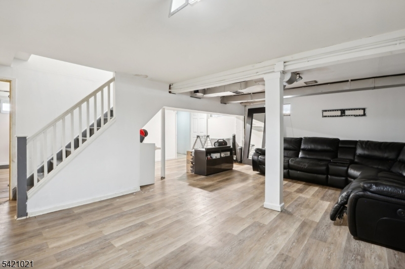 821 Hillside Road Rahway, NJ 07065 - Photo 25 of 33 a view of livingroom with furniture and staircase