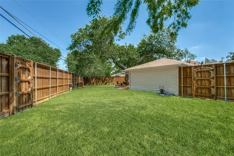 a view of backyard with green space