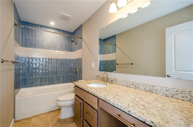 a bathroom with a sink and a vanity