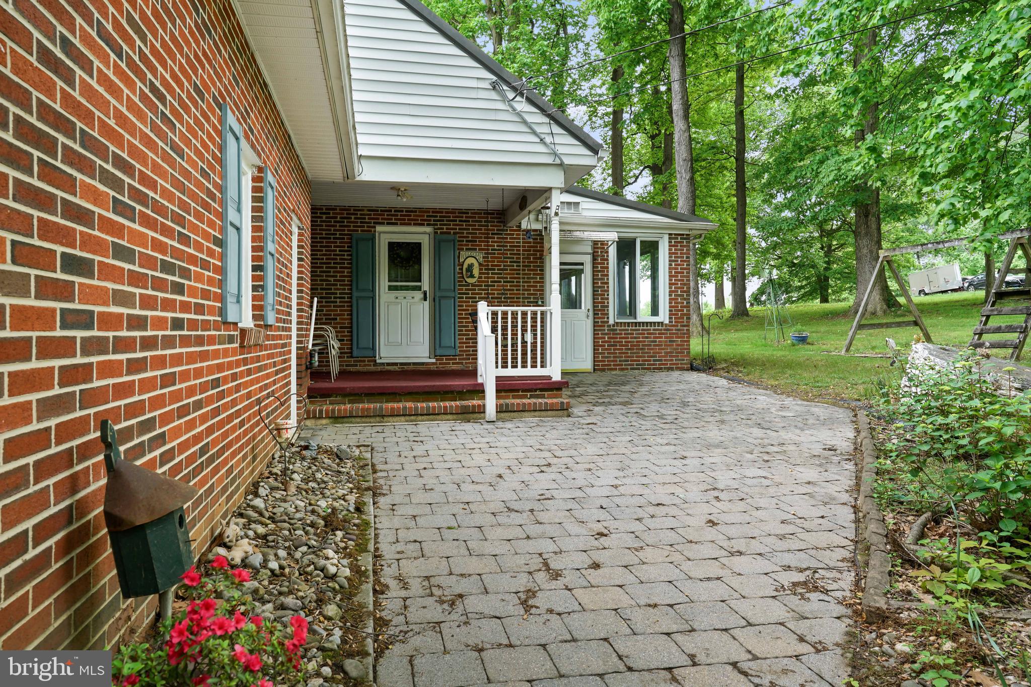608 Mt Zoar Road Conowingo, MD 21918 - Photo 7 of 42 Rear paver patio and back porch
