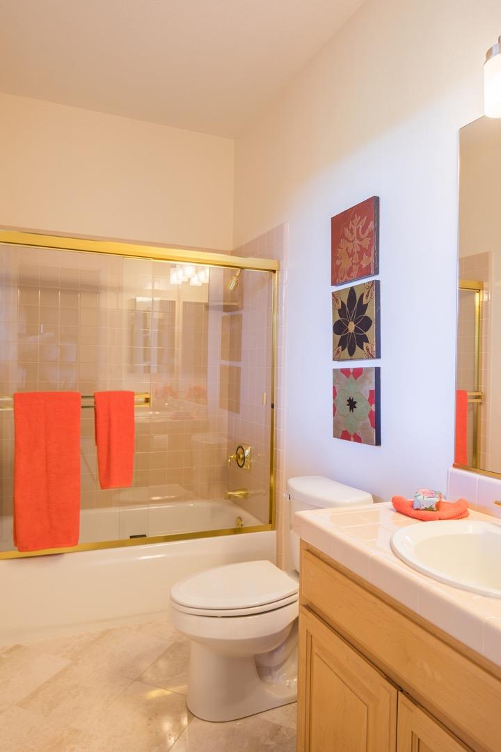 10439 Fairway Lane Carmel, CA 93923 - Photo 18 of 22 a bathroom with a sink a toilet and shower