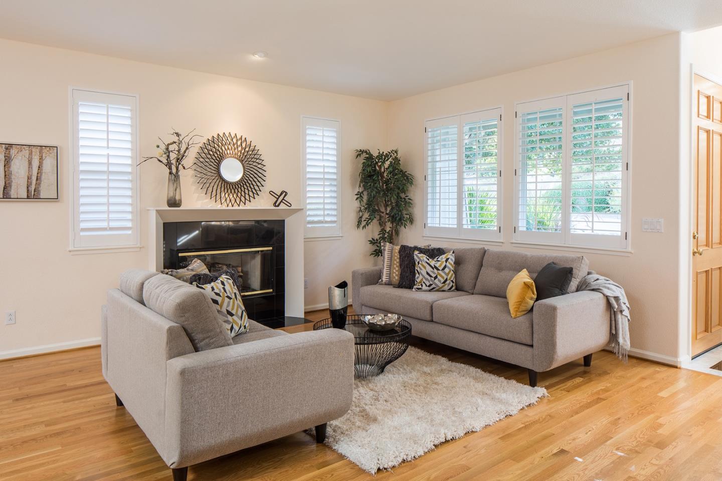 10439 Fairway Lane Carmel, CA 93923 - Photo 2 of 22 a living room with furniture and a fireplace