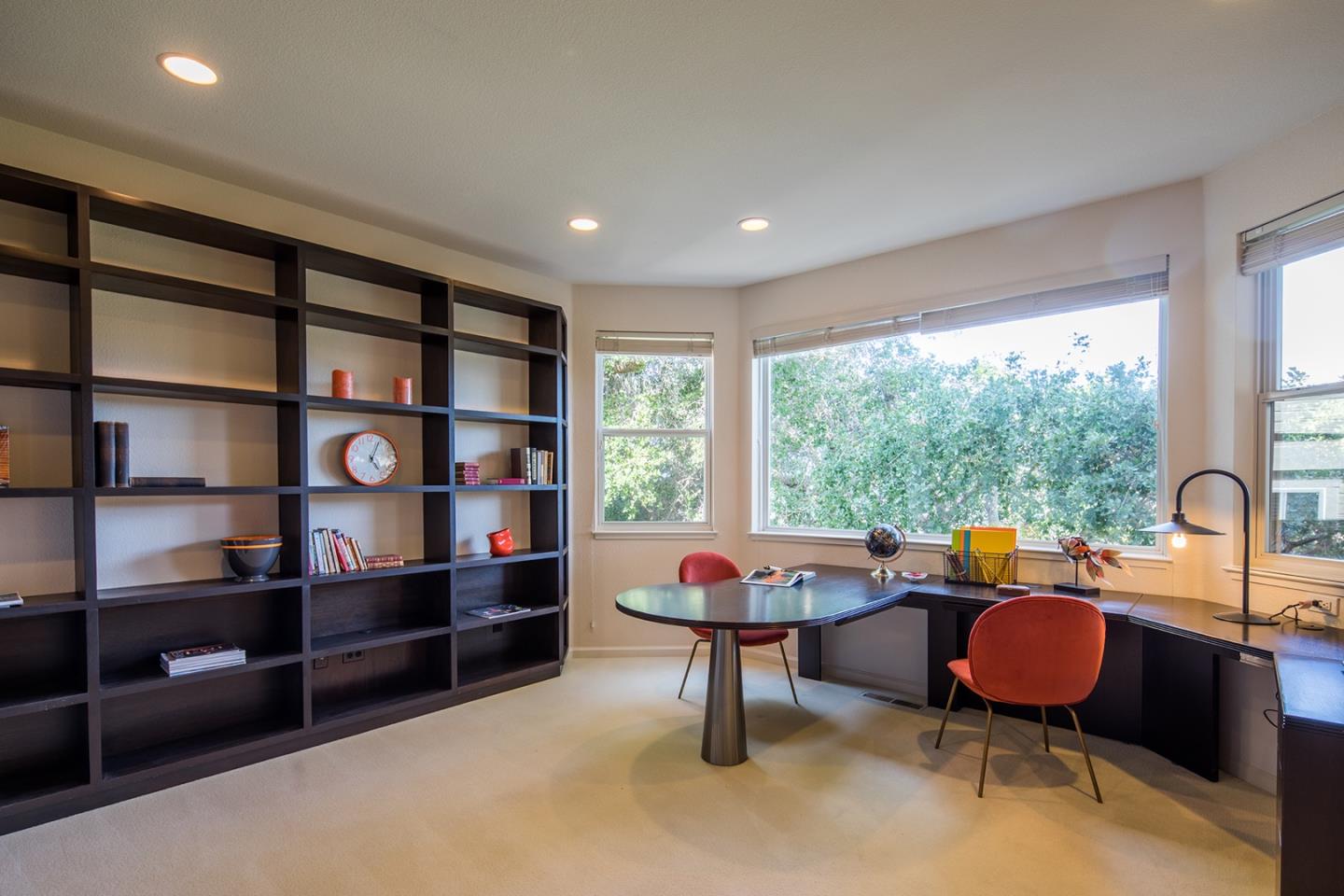 10439 Fairway Lane Carmel, CA 93923 - Photo 5 of 22 a living room with furniture a rug and a large window