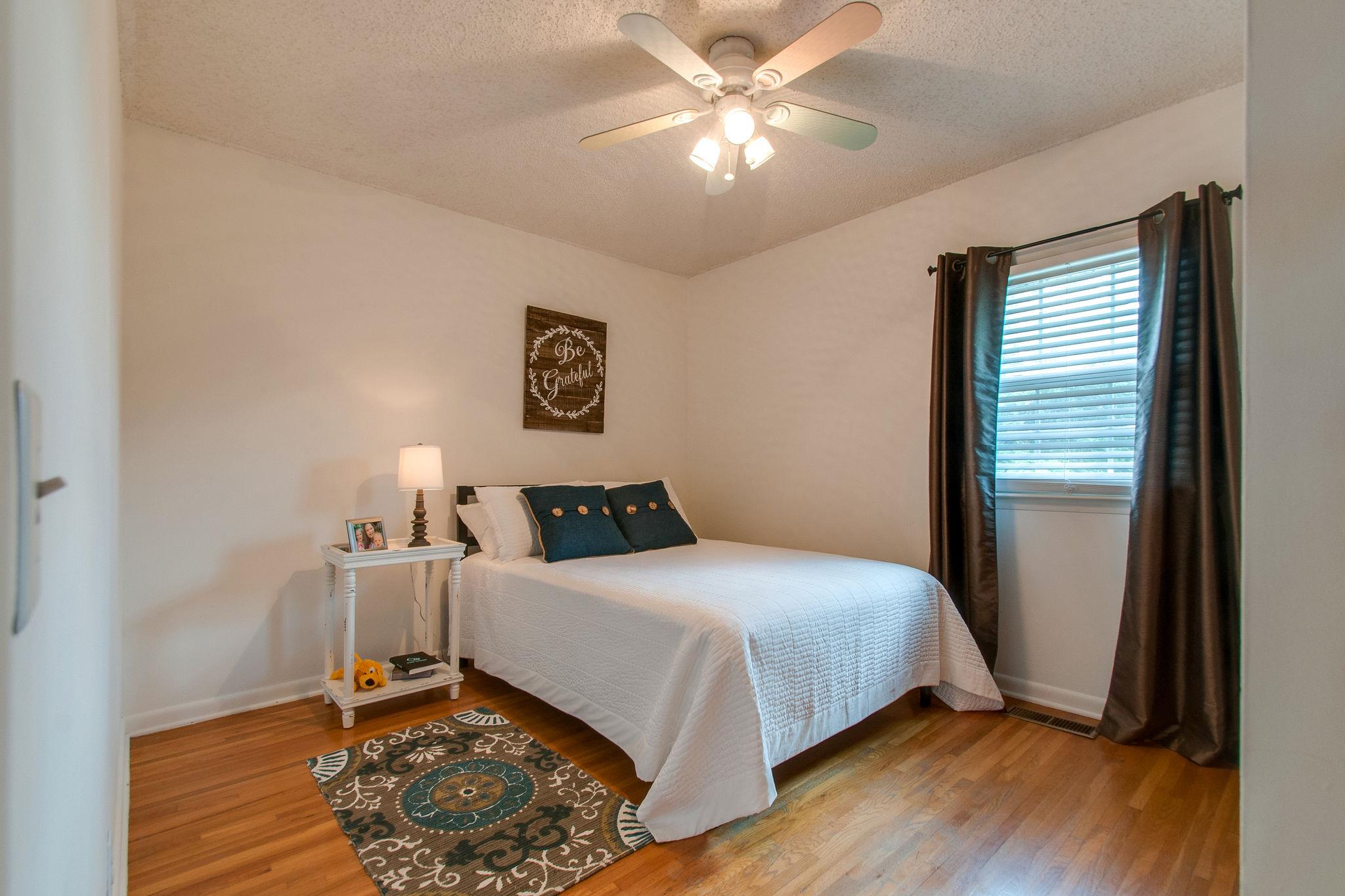 9576 Mullens Road Arrington, TN 37014 - Photo 16 of 26 a bedroom with a bed and a window