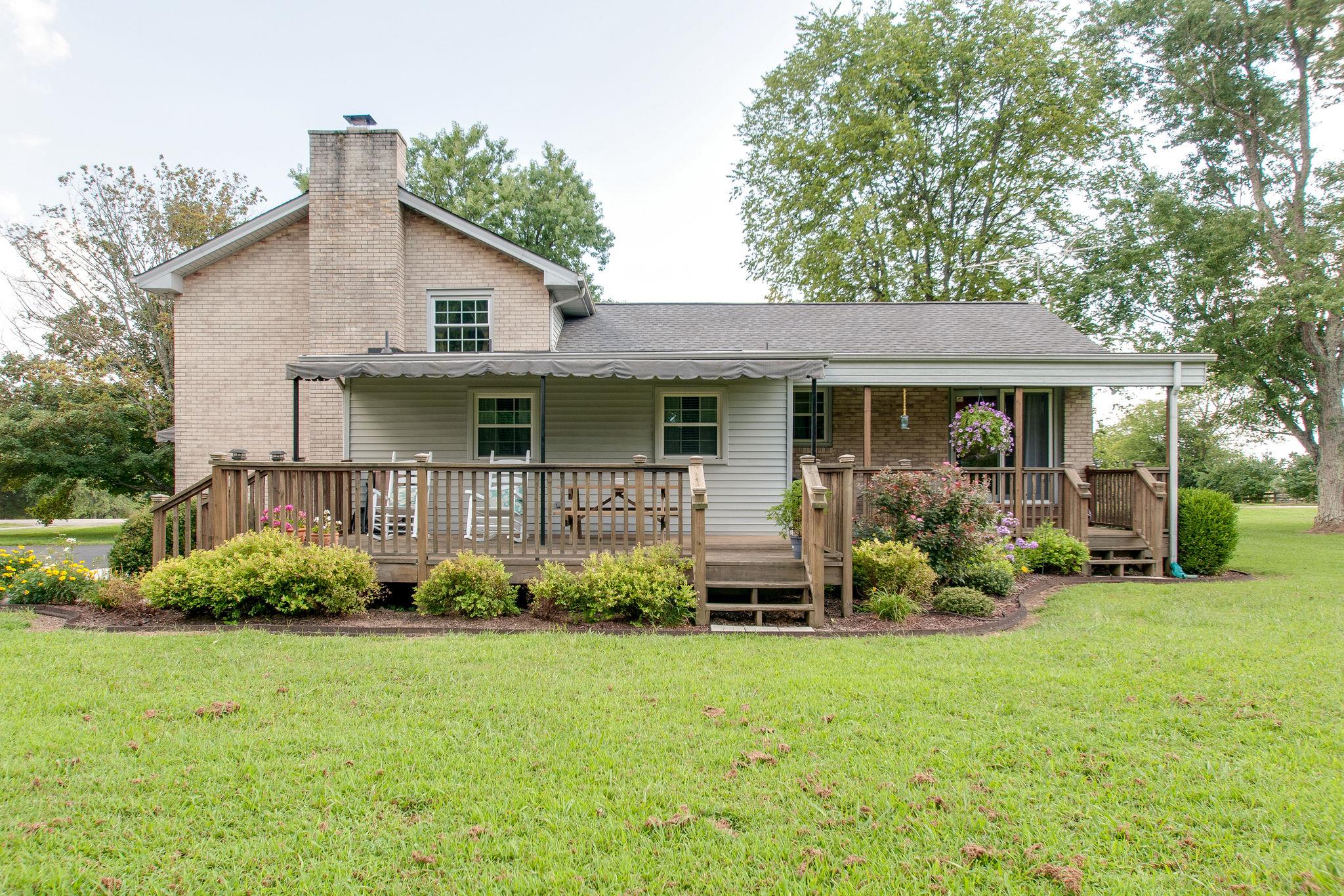 9576 Mullens Road Arrington, TN 37014 - Photo 20 of 26 a front view of house with yard and green space