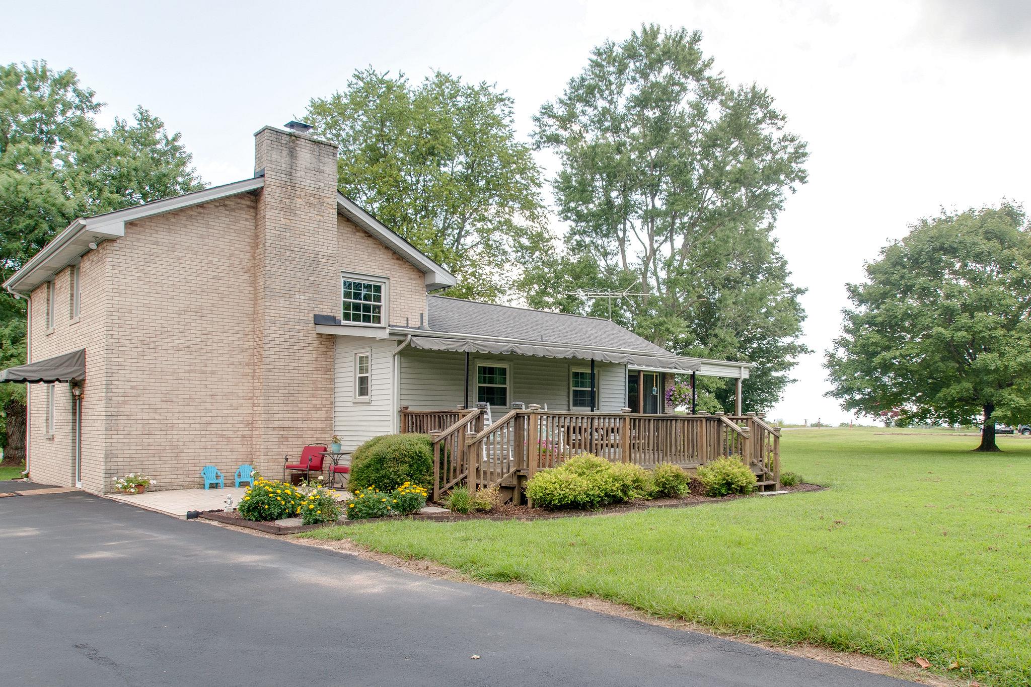 9576 Mullens Road Arrington, TN 37014 - Photo 21 of 26 a front view of house with yard and green space