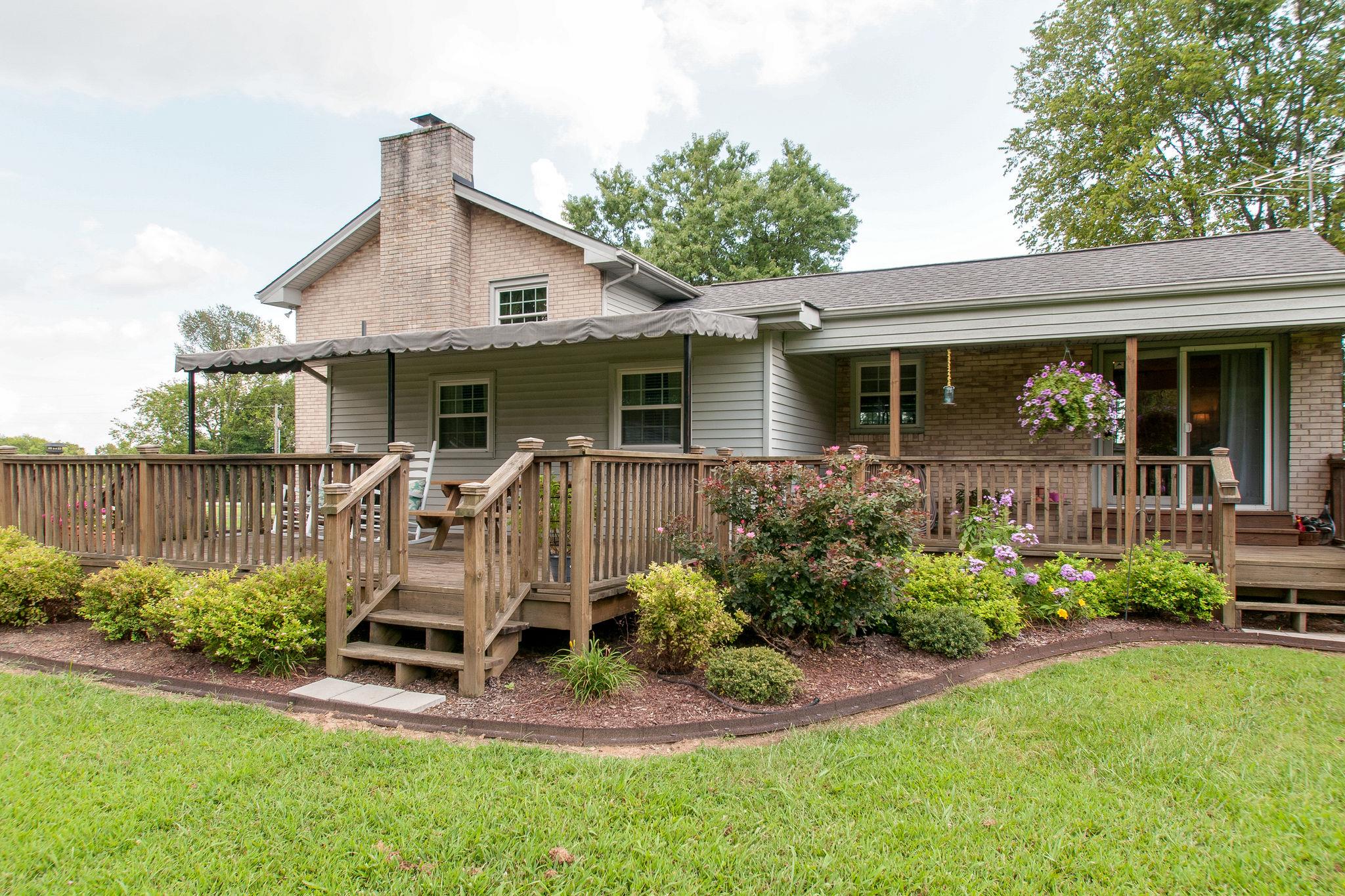 9576 Mullens Road Arrington, TN 37014 - Photo 22 of 26 a front view of a house with garden