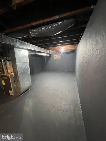 a view of kitchen and wooden floor