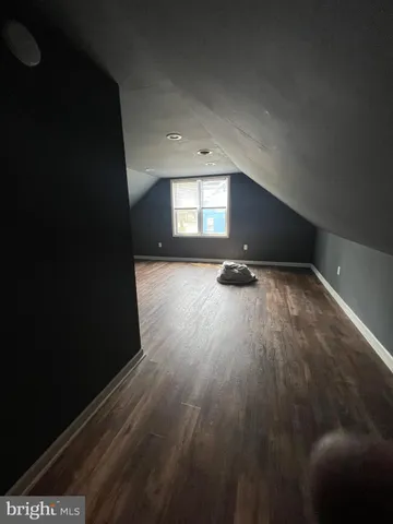 a bathroom with a tub and a shower
