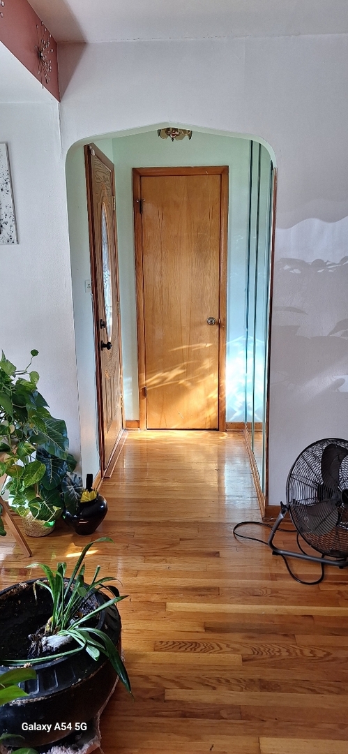 9351 South Normal Avenue Chicago, IL 60620 - Photo 3 of 14 a view of a room with gym equipment