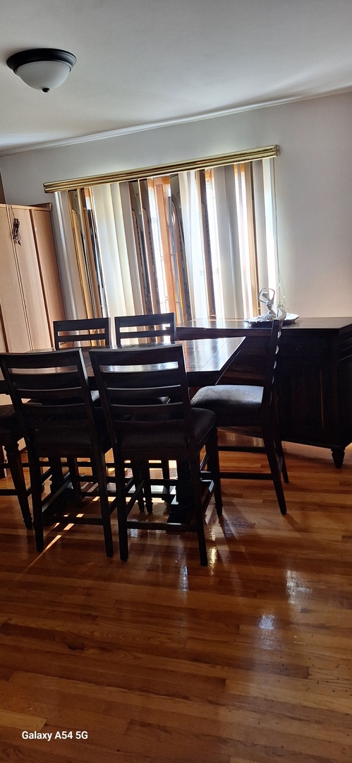 9351 South Normal Avenue Chicago, IL 60620 - Photo 7 of 14 a view of a room with furniture and window