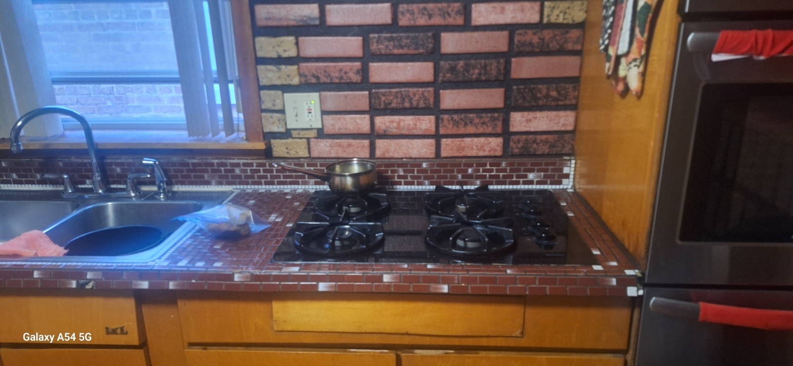 9351 South Normal Avenue Chicago, IL 60620 - Photo 10 of 14 a kitchen with counter top space and appliances