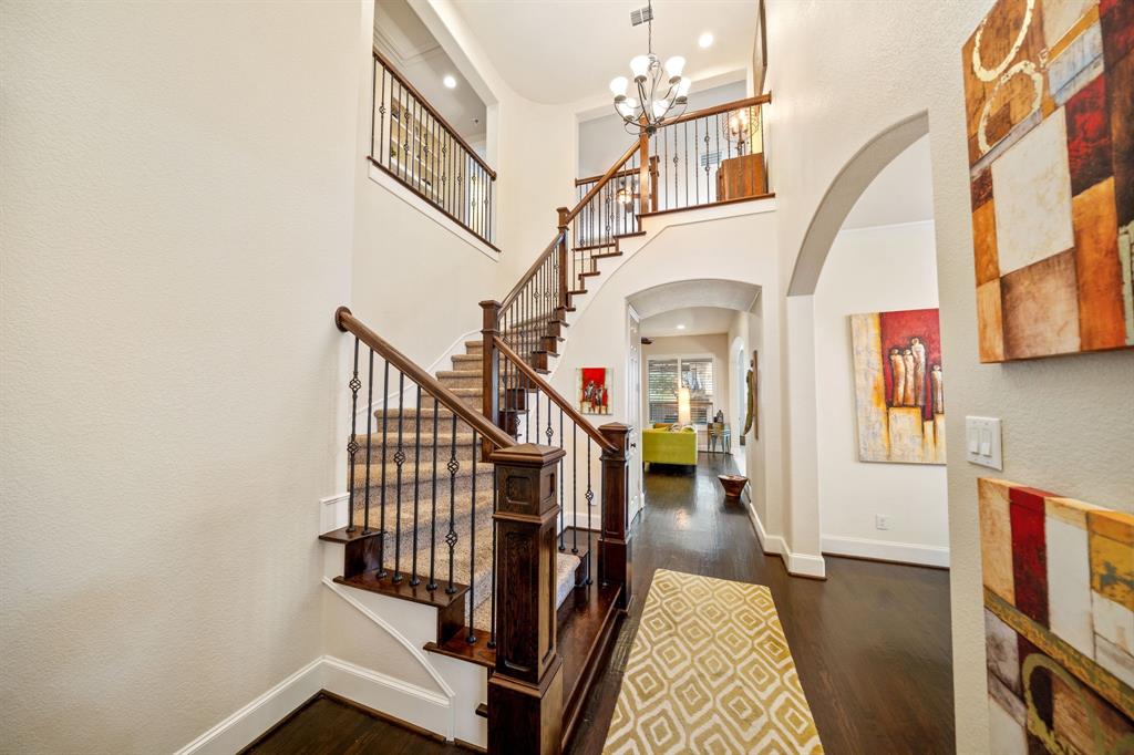 2114 Spicewood Drive Allen, TX 75013 - Photo 4 of 37 a view of entryway and hall with wooden floor