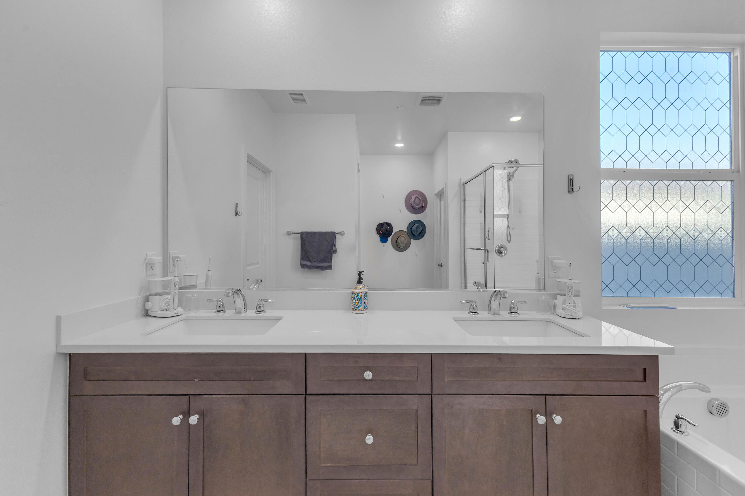 39763 Majorca Drive South Indio, CA 92203 - Photo 32 of 57 a bathroom with a double vanity sink mirror and double