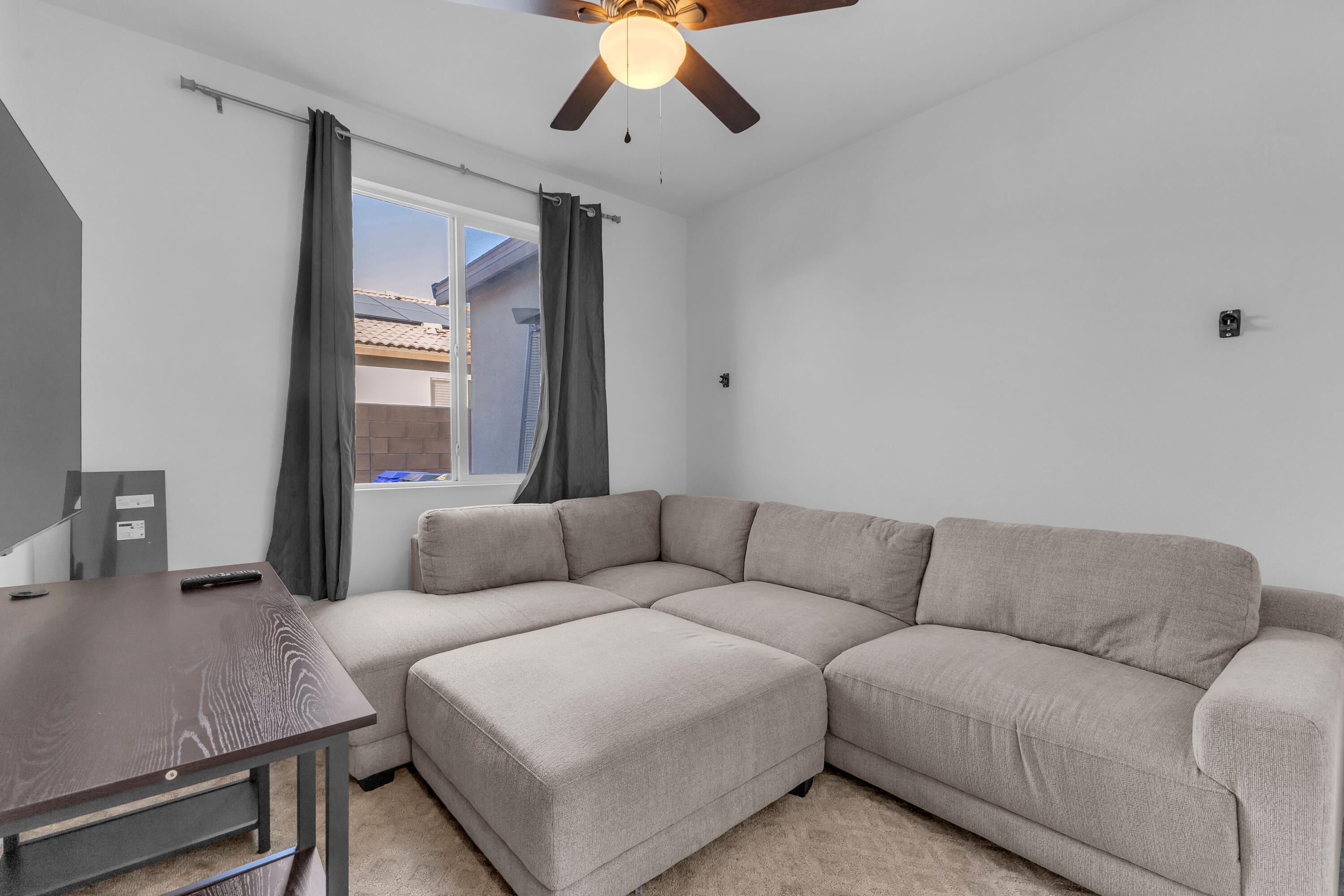 39763 Majorca Drive South Indio, CA 92203 - Photo 37 of 57 a living room with furniture and a large window