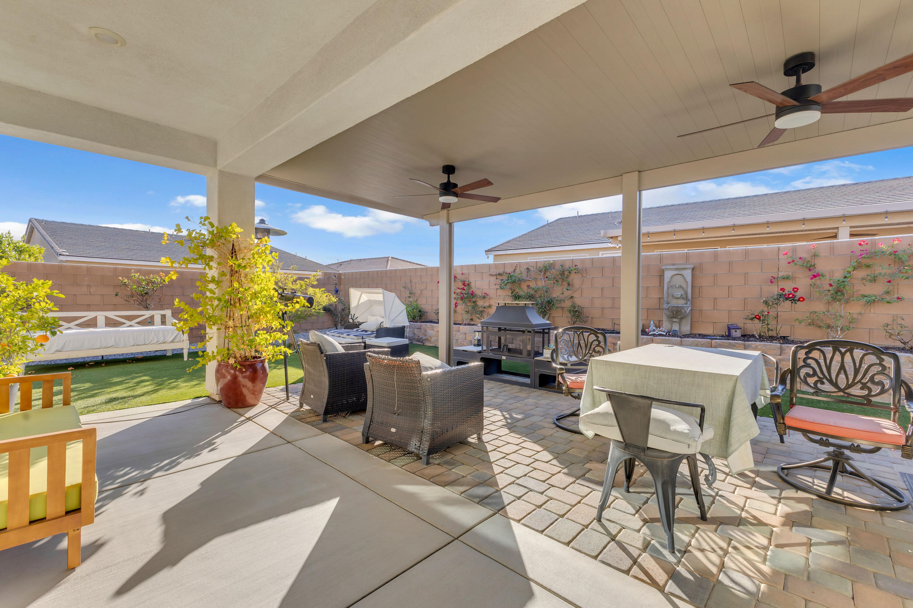 39763 Majorca Drive South Indio, CA 92203 - Photo 41 of 57 a living room with patio furniture and a chandelier