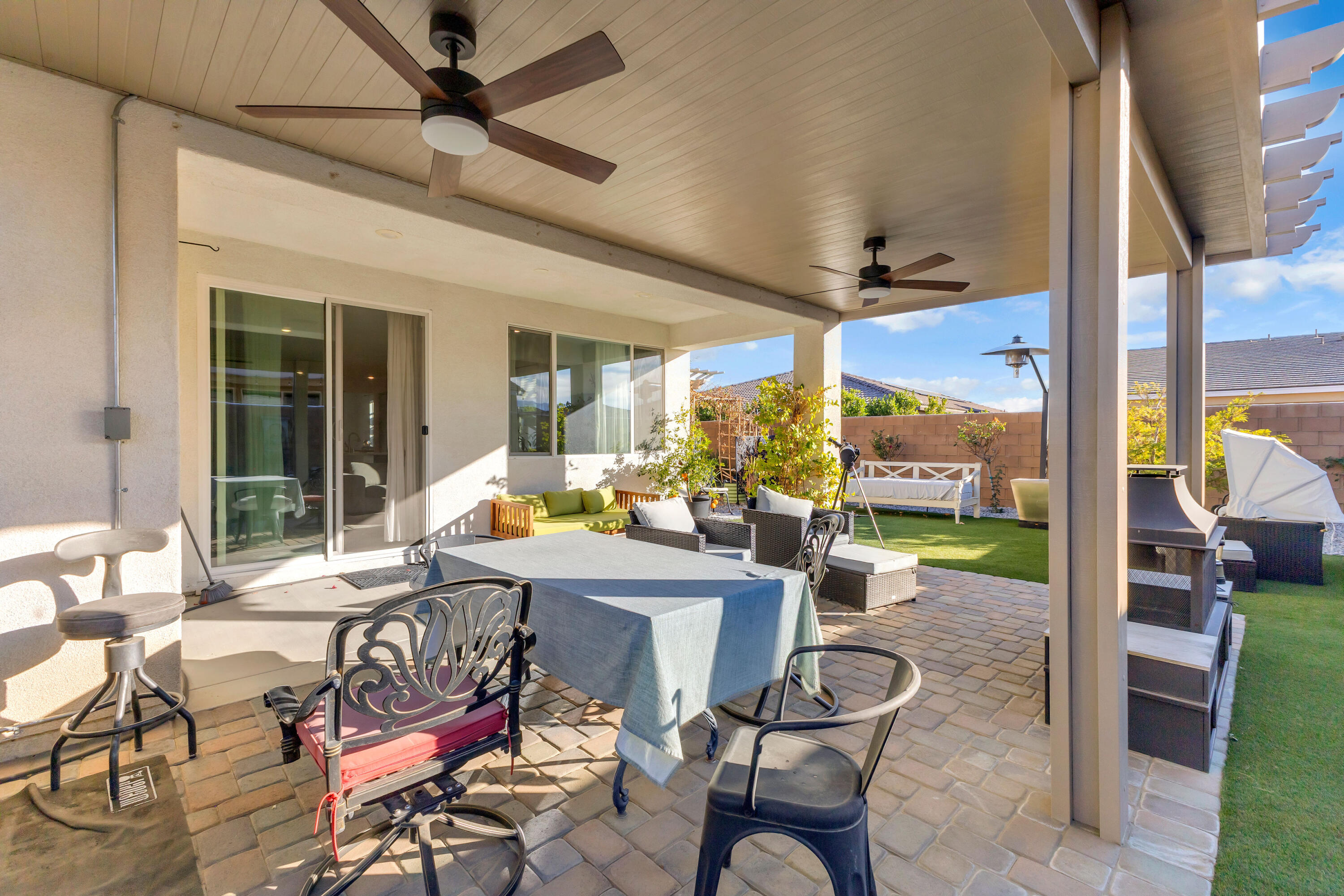 39763 Majorca Drive South Indio, CA 92203 - Photo 45 of 57 a view of a patio with a dining table and chairs