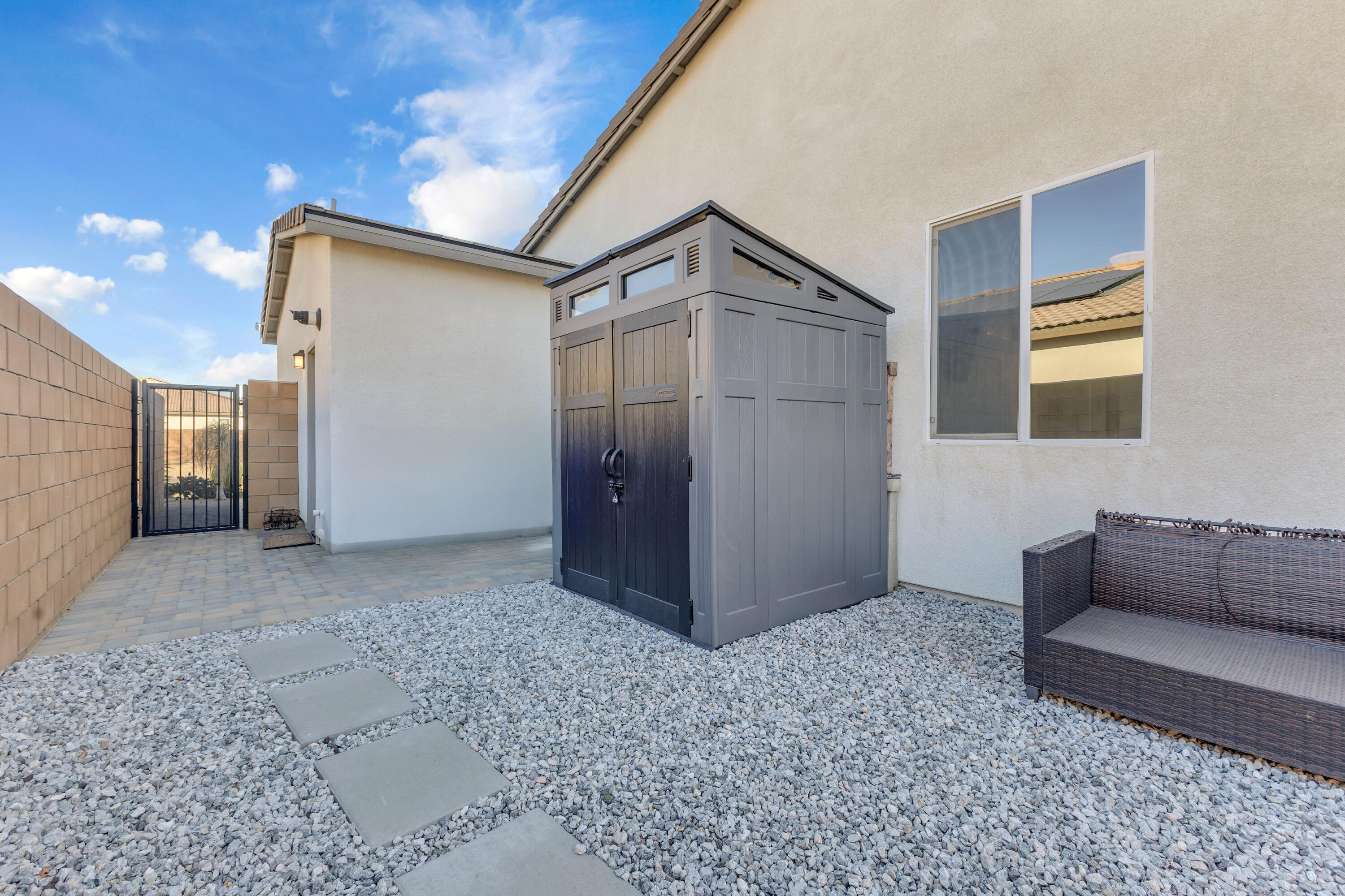 39763 Majorca Drive South Indio, CA 92203 - Photo 53 of 57 a view of livingroom with furniture and floor to ceiling window