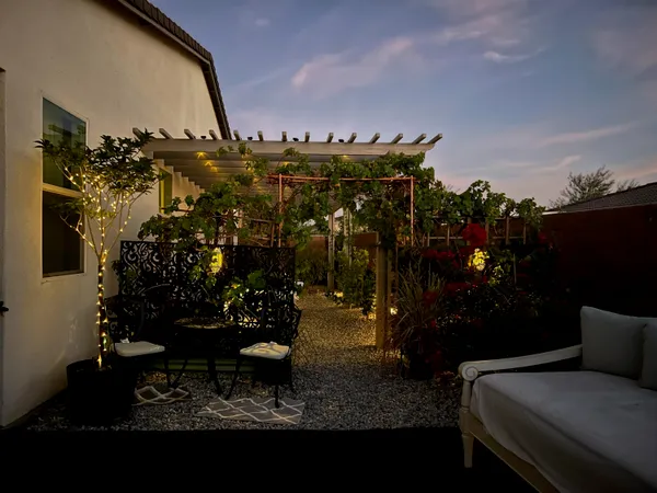a view of a dining room with furniture and window