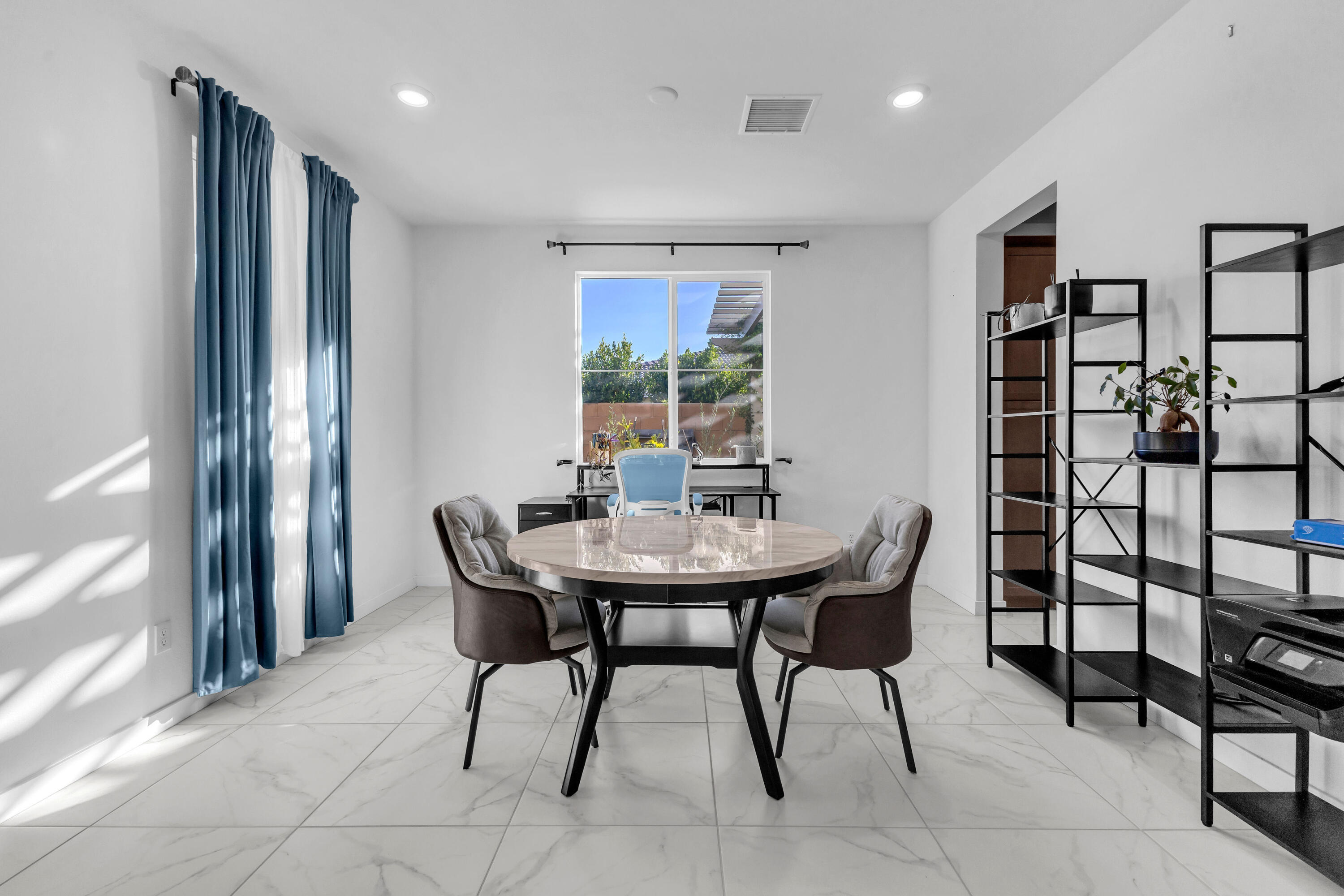 39763 Majorca Drive South Indio, CA 92203 - Photo 8 of 57 a view of a dining room with furniture and window