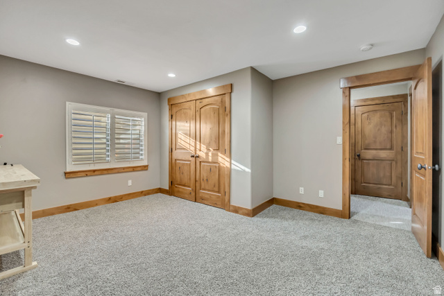 896 West 675 South Mapleton, UT 84664 - Photo 44 of 77 Unfurnished bedroom with light carpet, a closet, and recessed lighting
