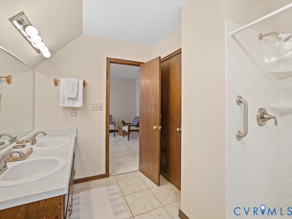1145 Timber Trace Road Powhatan, VA 23139 - Photo 23 of 32 a bathroom with a sink and mirror