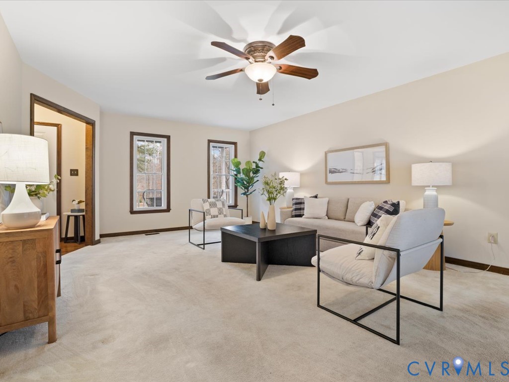 1145 Timber Trace Road Powhatan, VA 23139 - Photo 4 of 32 a living room with furniture and windows