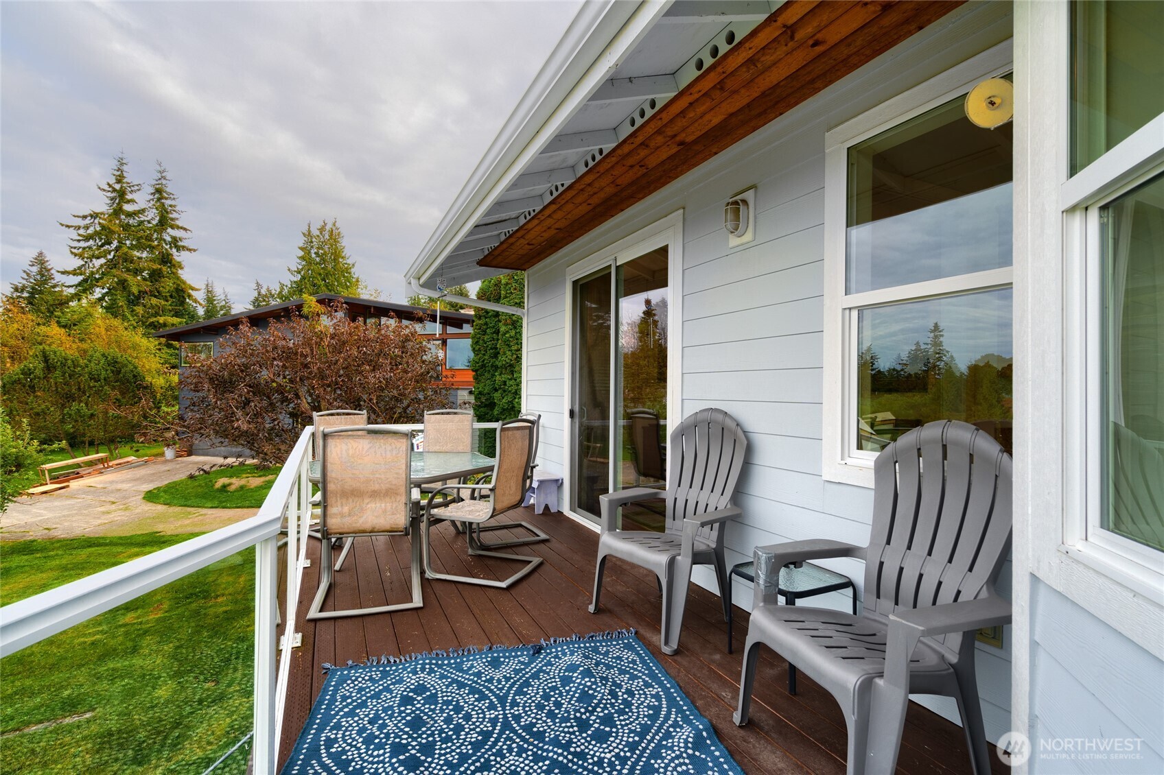 4111 R Avenue Anacortes, WA 98221 - Photo 17 of 37 a view of a chair and table in the patio